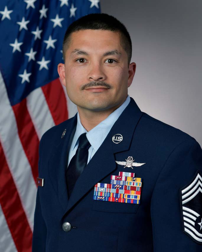 Chief Master Sergeant BRUCE W. WOO